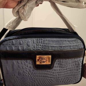 Madi Claire Blue and Black Crocodile Pattern Women’s Bag. Corn flower blue.